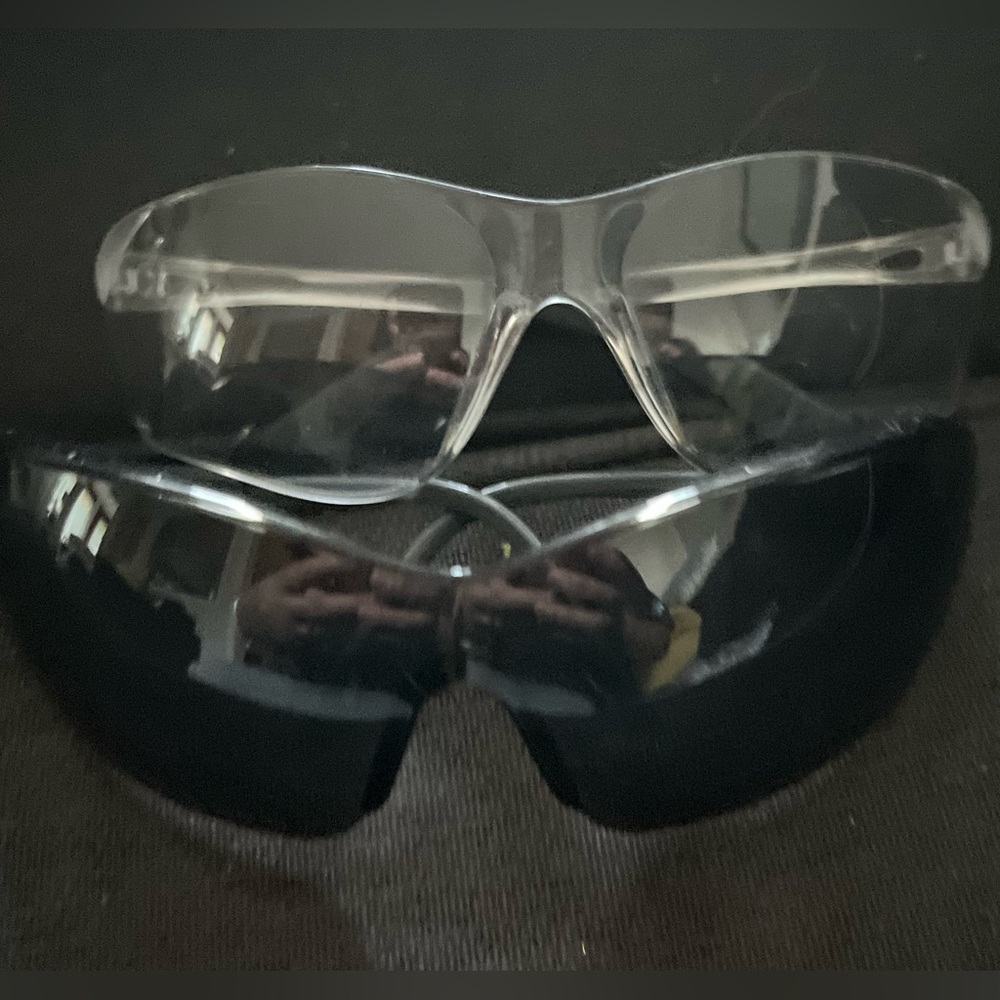 2 pairs of Work safely glasses 1 sunglasses and 1 clear glasses